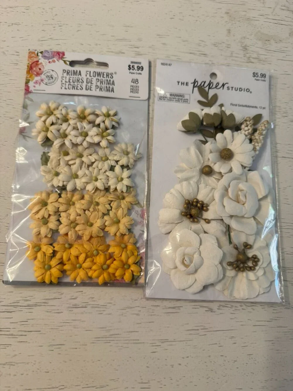 10 packages of fabric floral embellishments, NWT in beautiful colors
